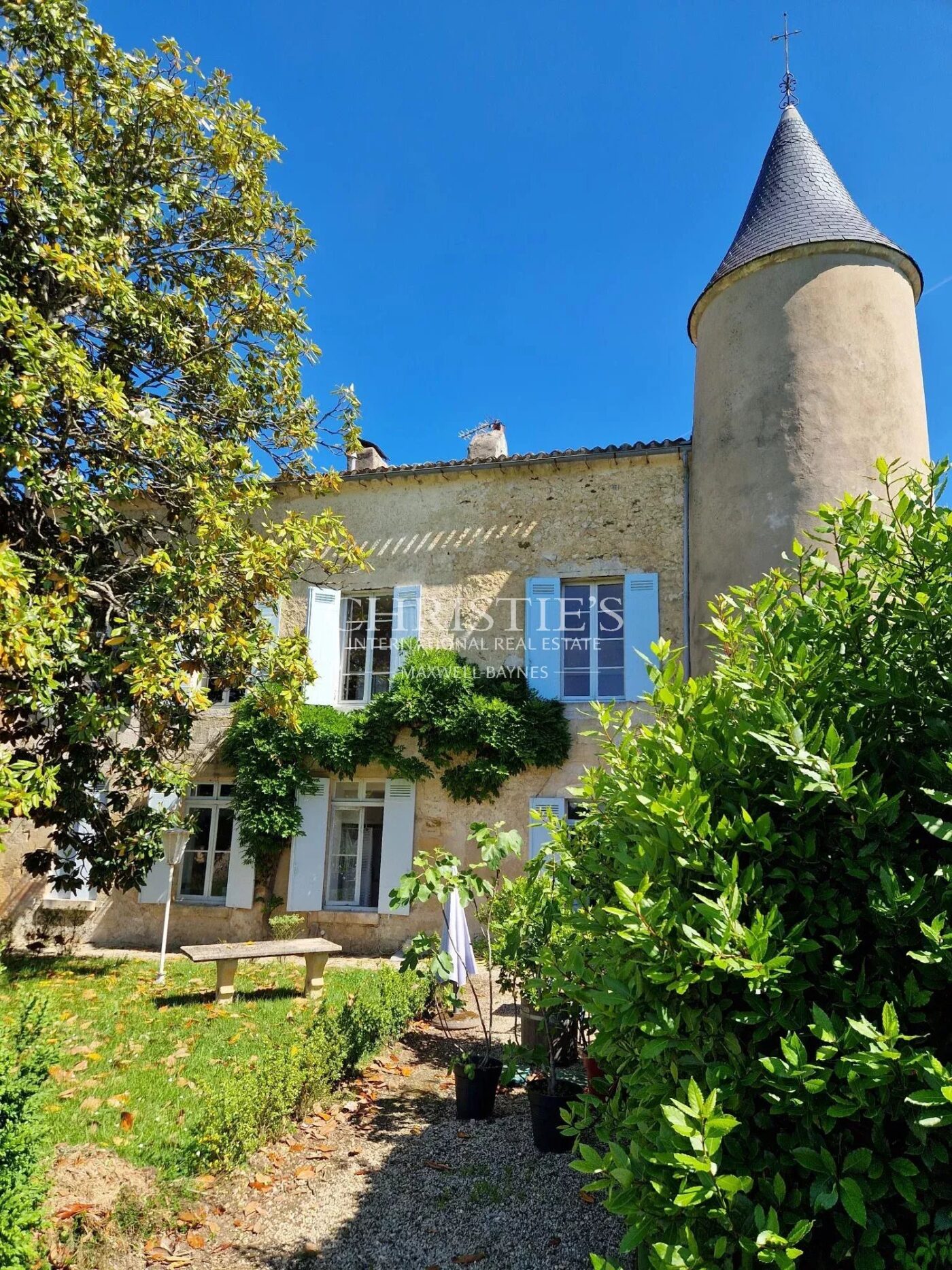 Exclusive listing historic 15th-C fortified château near Bordeaux with approx. 6 ha of vines