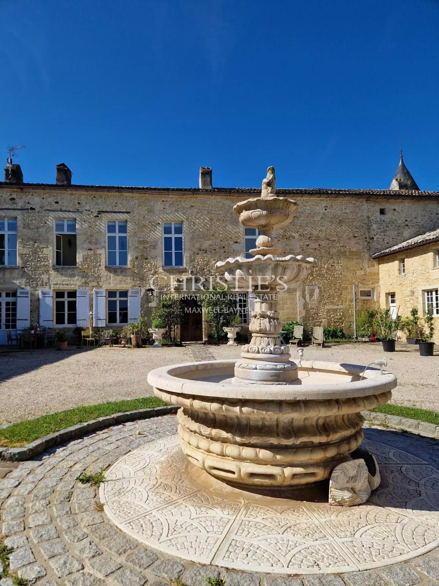 Exclusive listing historic 15th-C fortified château near Bordeaux with approx. 6 ha of vines