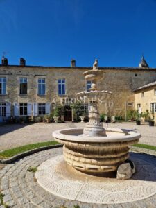 Exclusive listing historic 15th-C fortified château near Bordeaux with approx. 6 ha of vines