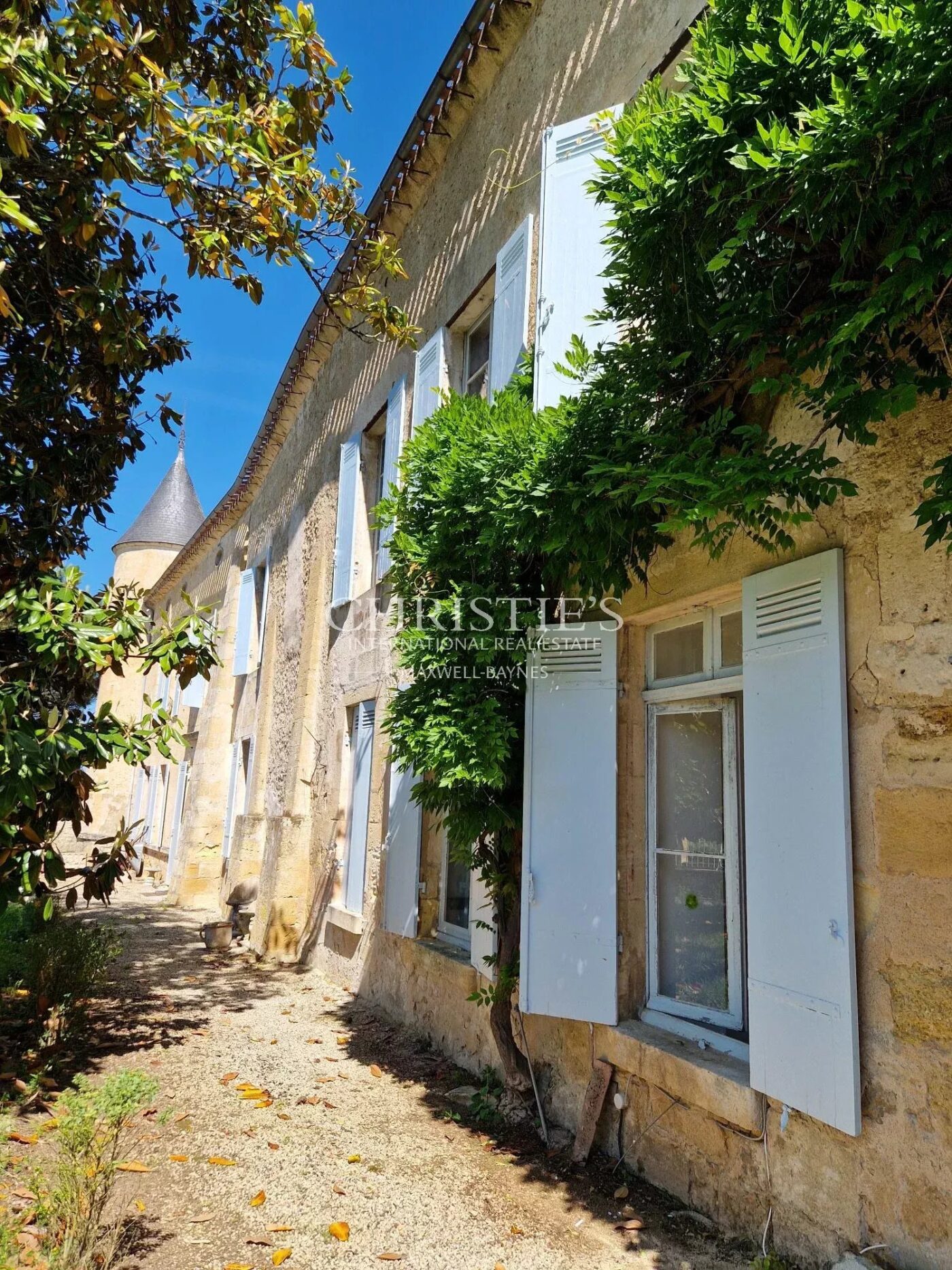 Exclusive listing historic 15th-C fortified château near Bordeaux with approx. 6 ha of vines