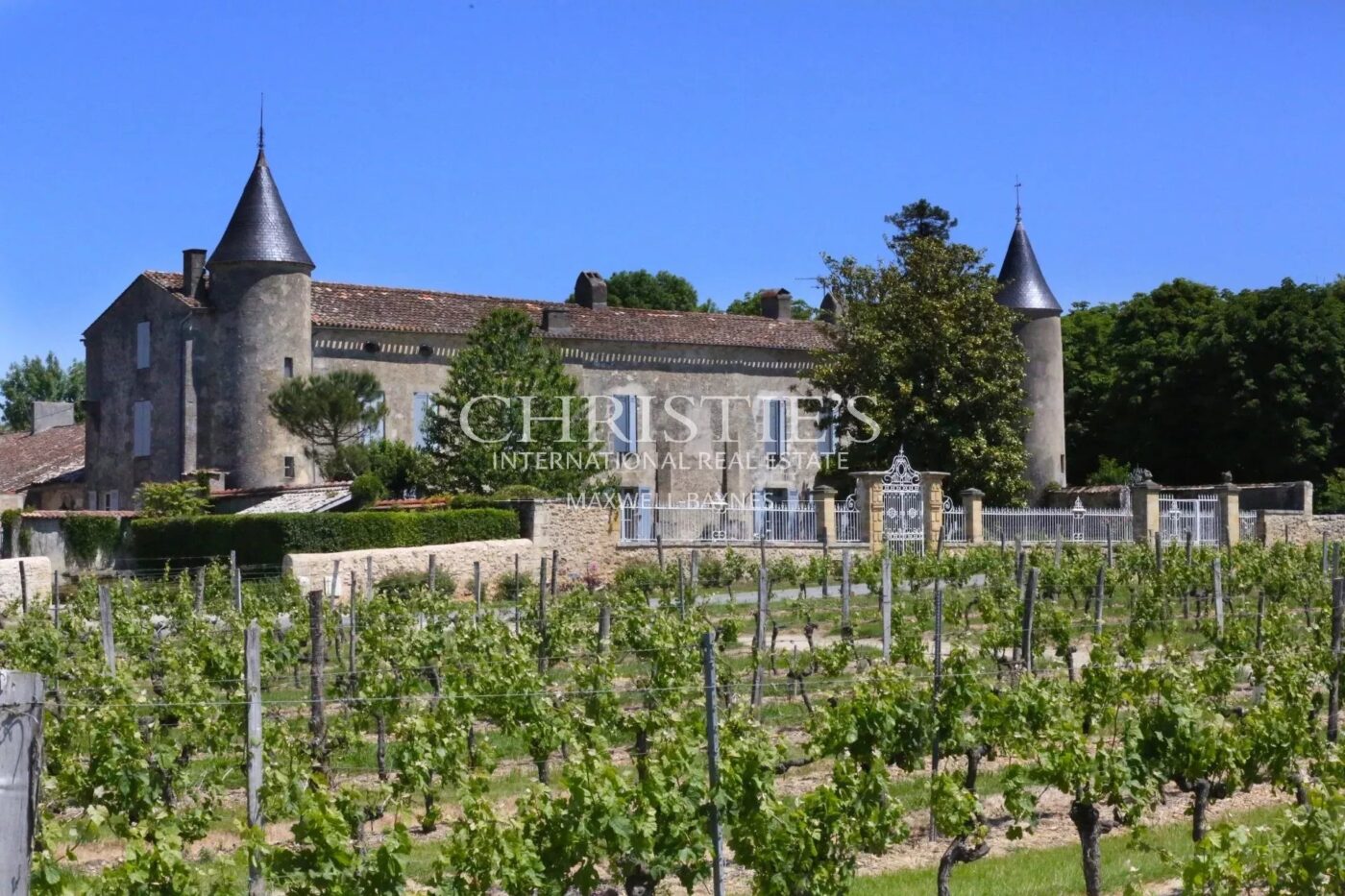 Exclusive listing historic 15th-C fortified château near Bordeaux with approx. 6 ha of vines
