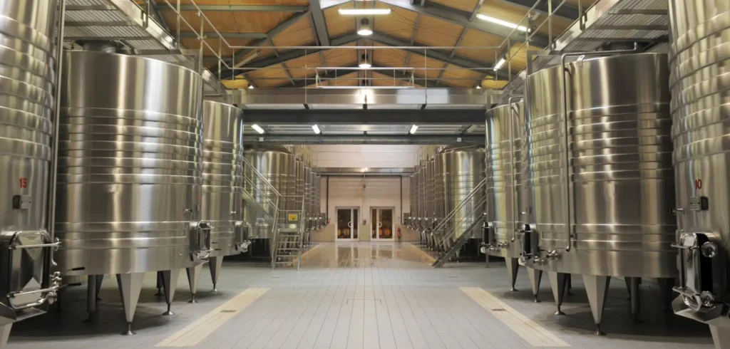 Fermentation tanks in a Bordeaux château cellar